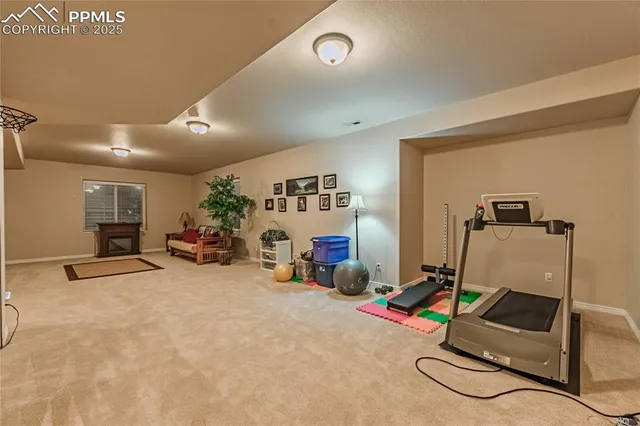 a view of a room with gym equipment