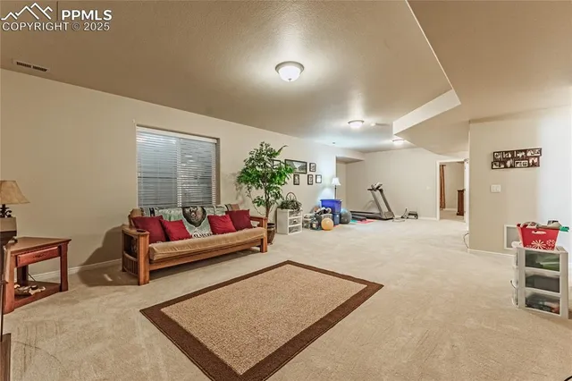 a living room with furniture and a couch