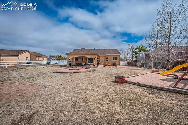 a view of house with outdoor space