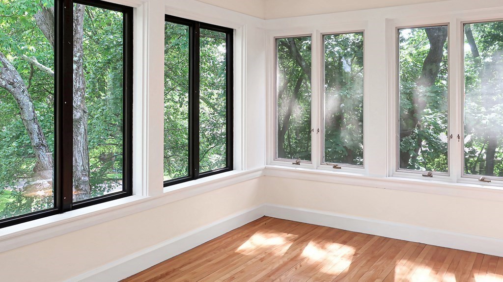 39 Locust Avenue Lexington, MA 02421 - Photo 16 of 32 wooden floor in an empty room with a window
