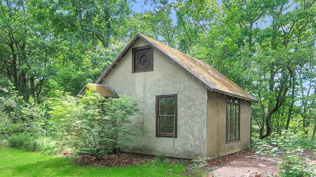 39 Locust Avenue Lexington, MA 02421 - Photo 23 of 32 a view of a house with backyard