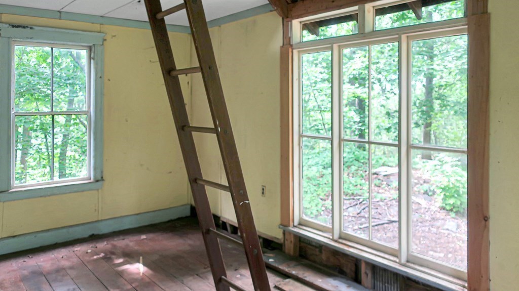 39 Locust Avenue Lexington, MA 02421 - Photo 25 of 32 a view of an empty room with a window
