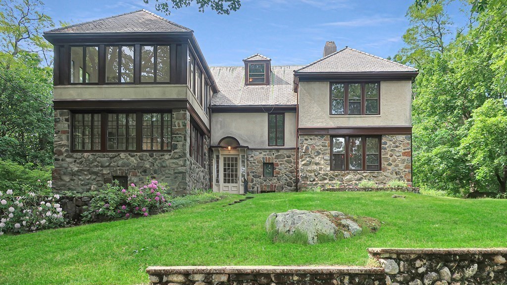 39 Locust Avenue Lexington, MA 02421 - Photo 28 of 32 a front view of a house with garden