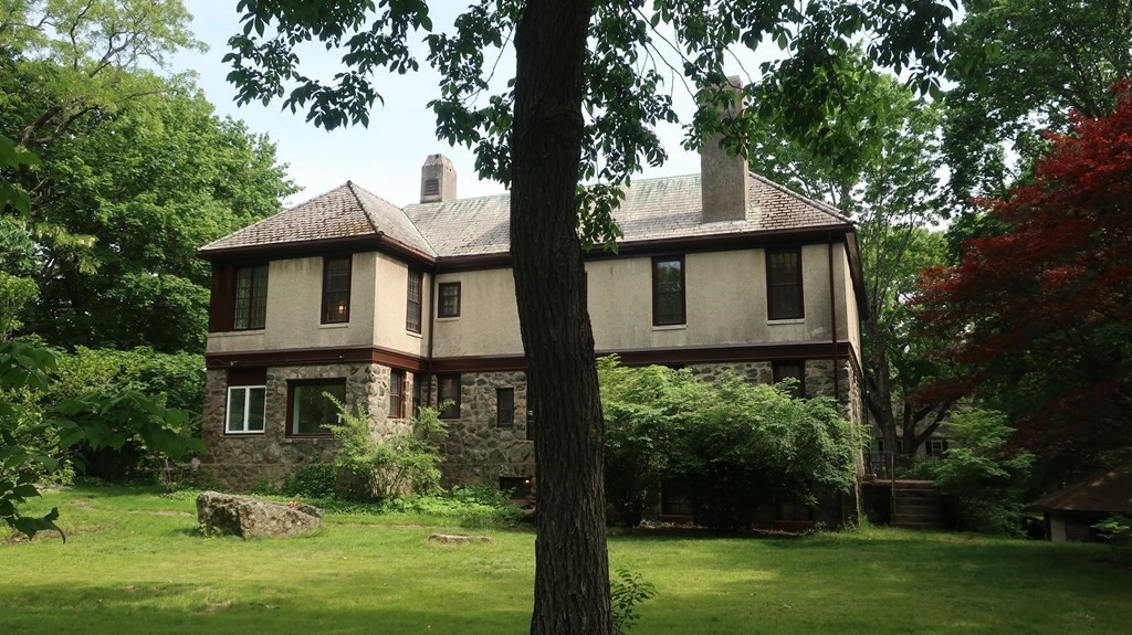 39 Locust Avenue Lexington, MA 02421 - Photo 31 of 32 a front view of a house with a yard