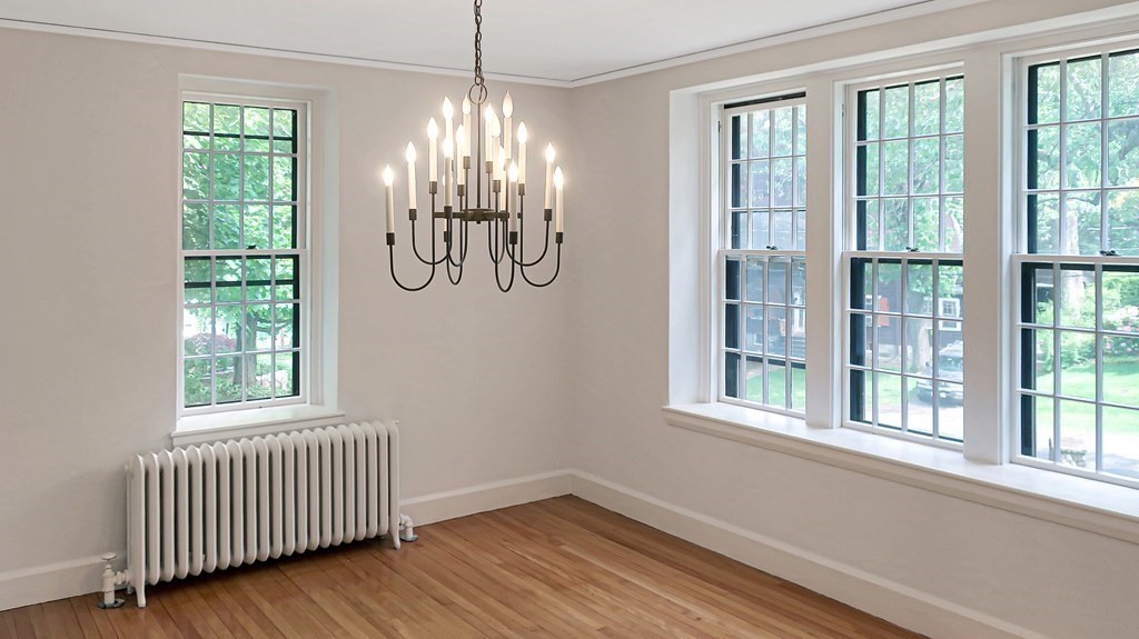 39 Locust Avenue Lexington, MA 02421 - Photo 6 of 32 a view of entryway with window and wooden floor