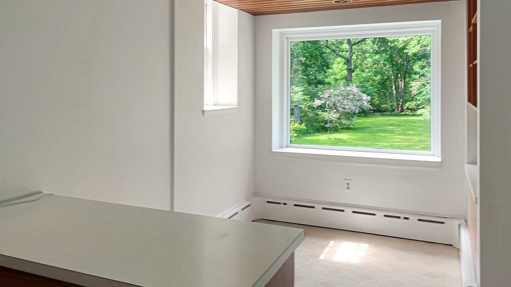 39 Locust Avenue Lexington, MA 02421 - Photo 9 of 32 a view of a room that has a window