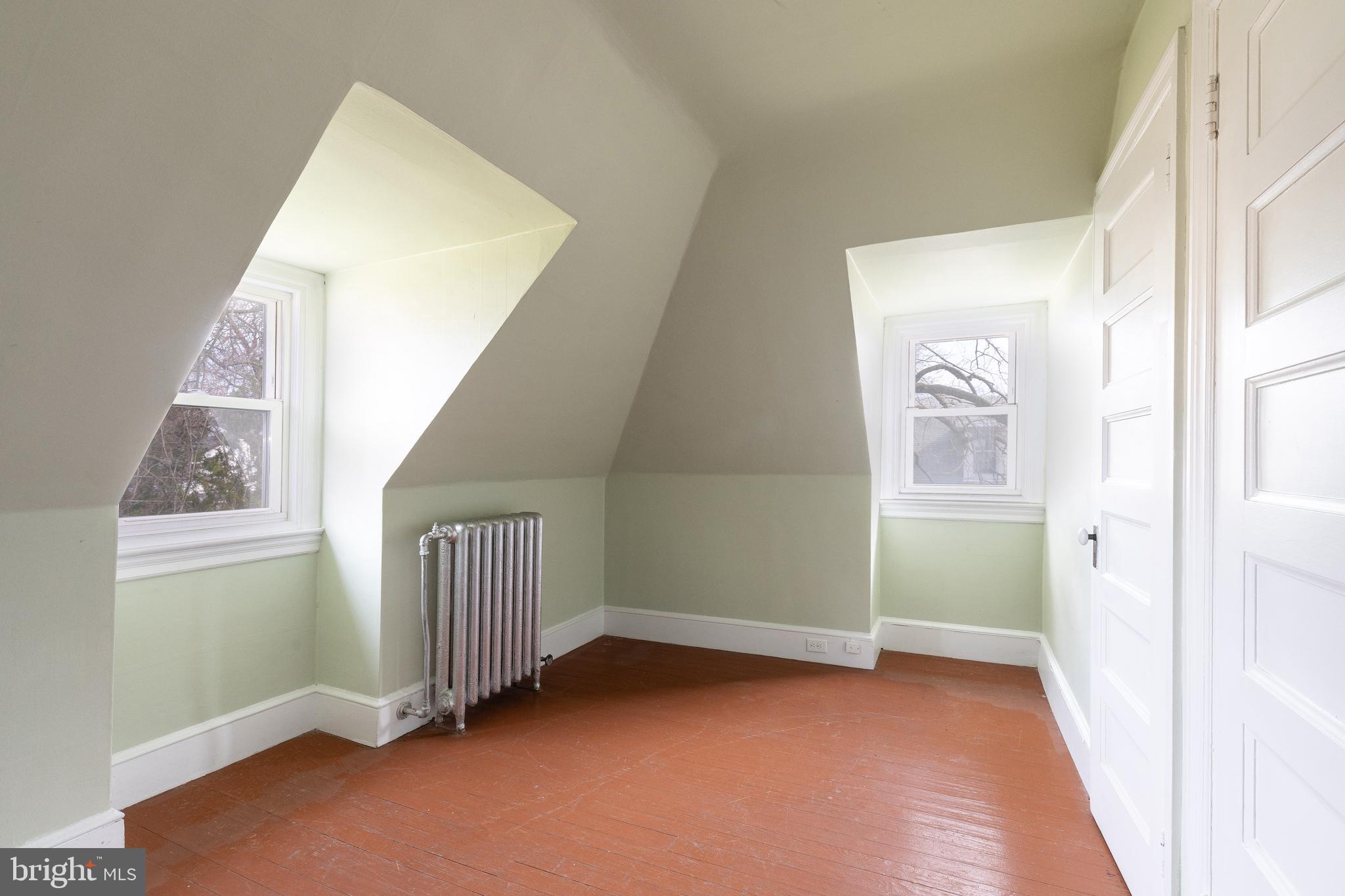 112 East Township Line Road Havertown, PA 19083 - Photo 20 of 40 a view of a room with staircase and white walls
