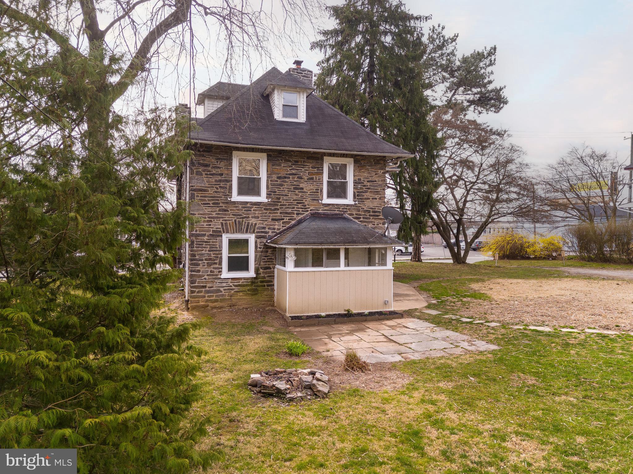 112 East Township Line Road Havertown, PA 19083 - Photo 25 of 40 a front view of a house with a yard and trees
