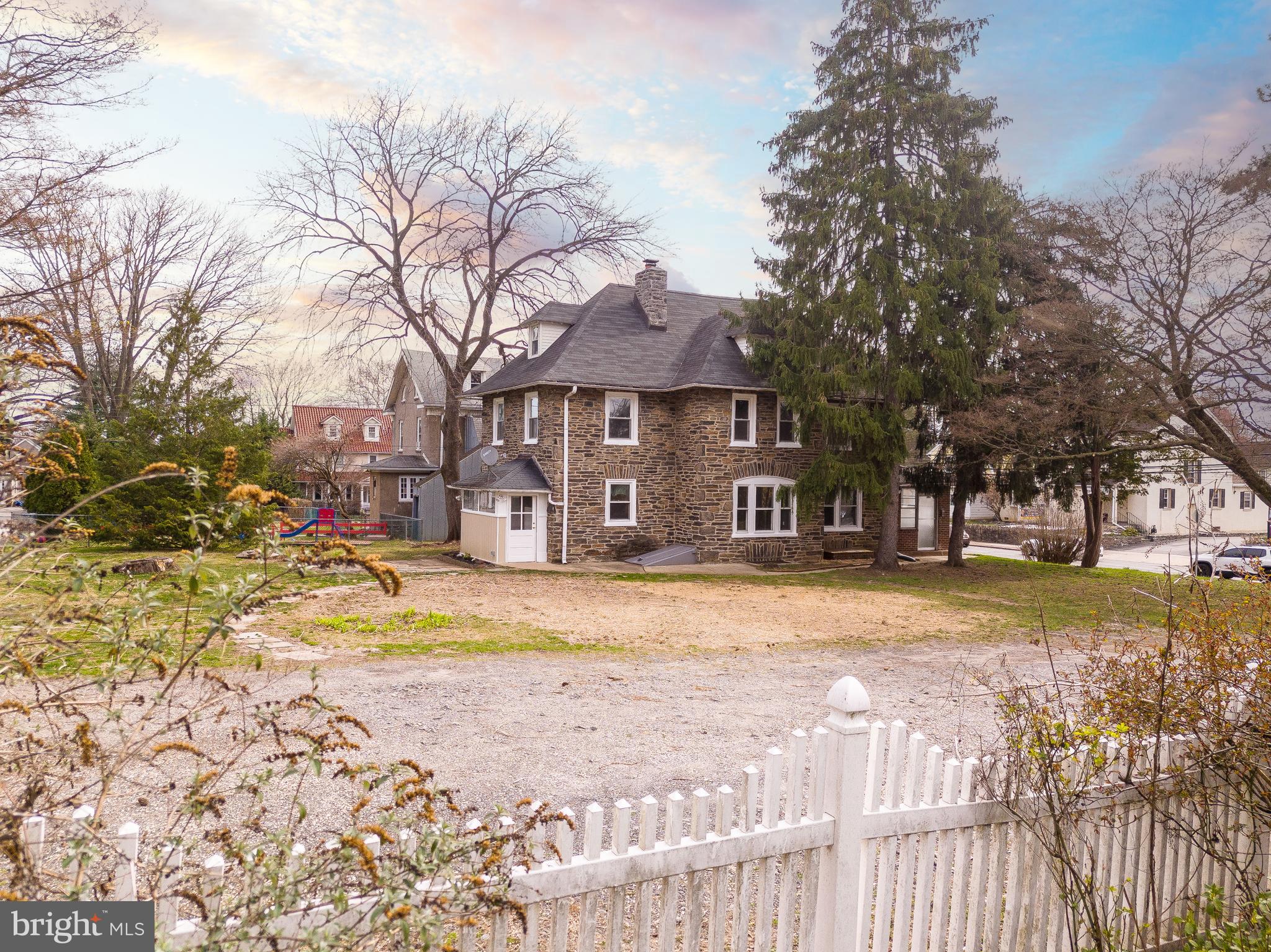 112 East Township Line Road Havertown, PA 19083 - Photo 28 of 40 a view of a yard with a large tree
