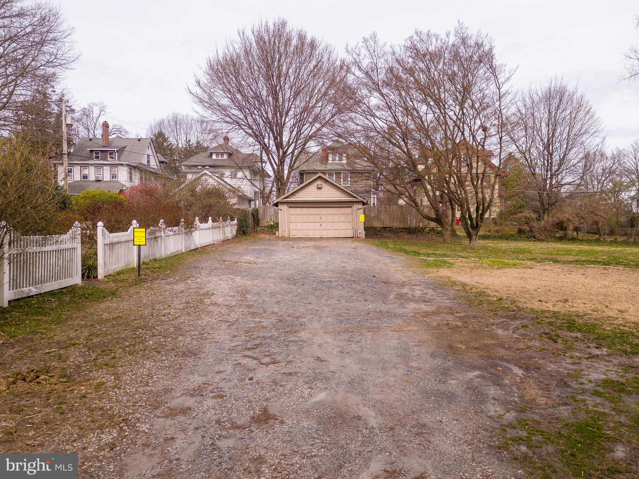 112 East Township Line Road Havertown, PA 19083 - Photo 30 of 40 a view of a yard with a house and trees in the background