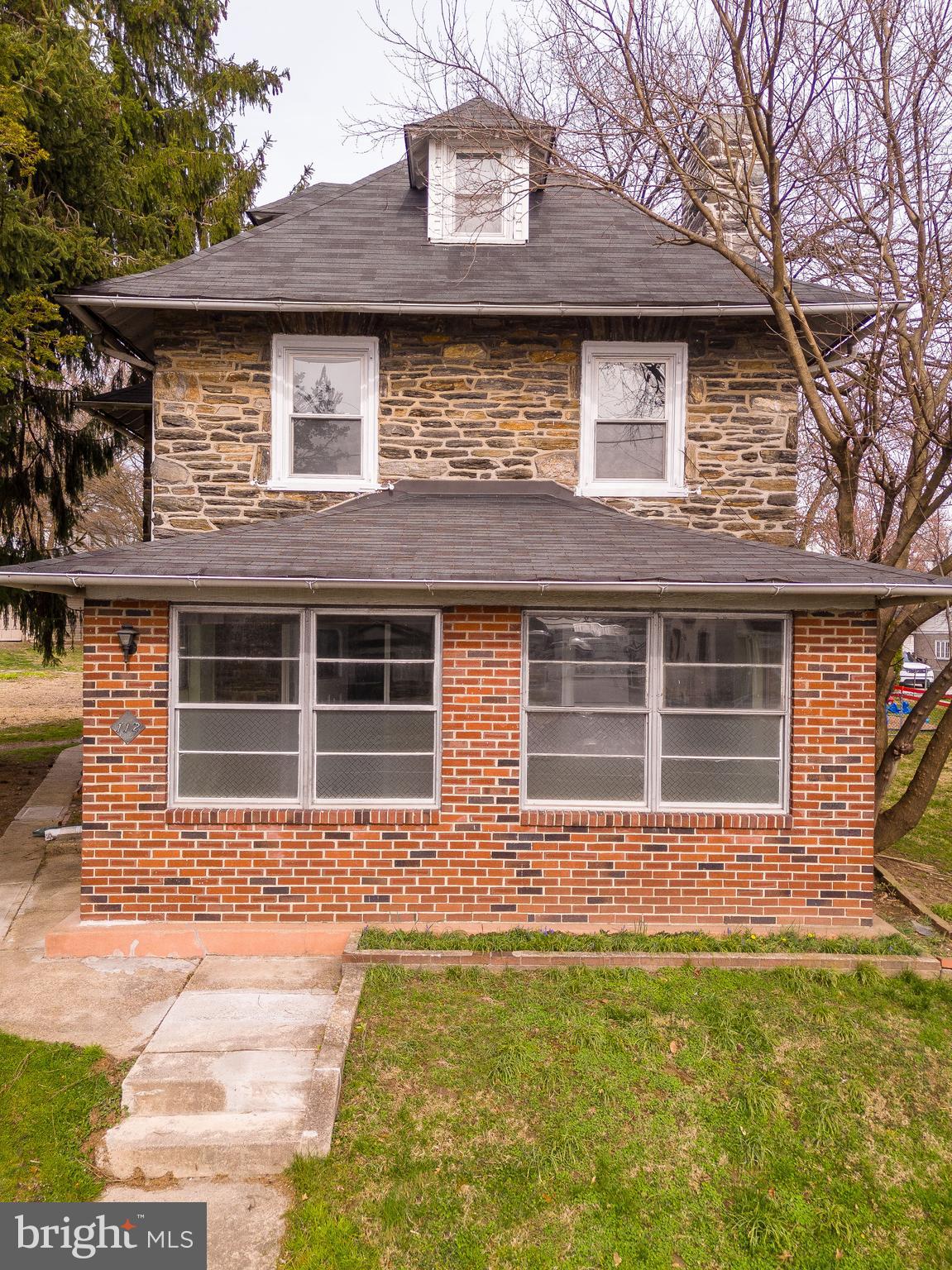 112 East Township Line Road Havertown, PA 19083 - Photo 33 of 40 a front view of a house with garden