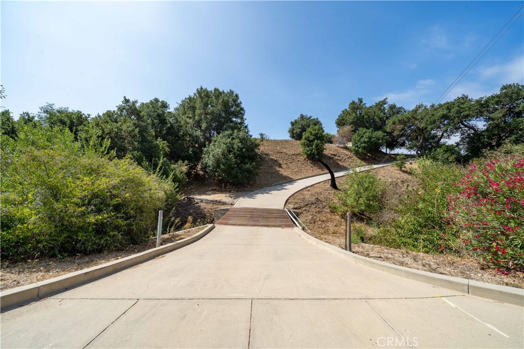 5767 Latigo Canyon Road Malibu, CA 90265 - Photo 37 of 54 Partial view of Private, paved driveway entrance
