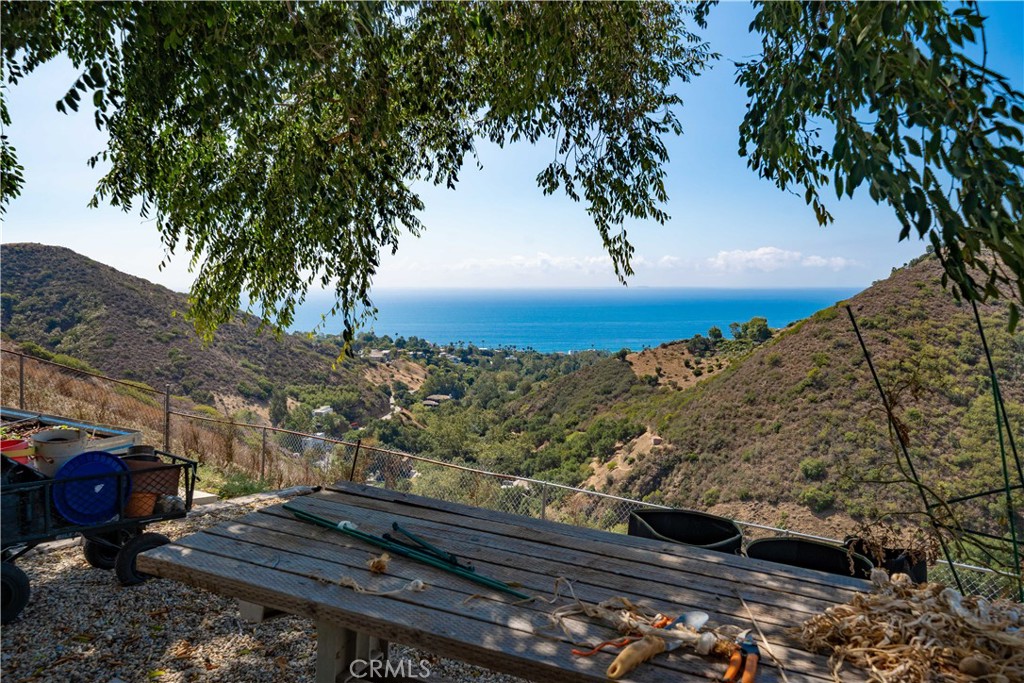 5767 Latigo Canyon Road Malibu, CA 90265 - Photo 4 of 54 Partial view of the ocean and canyons from back yard