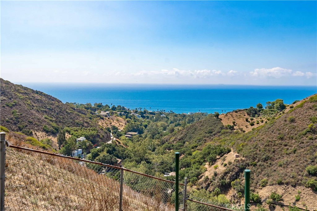 5767 Latigo Canyon Road Malibu, CA 90265 - Photo 5 of 54 Partial view of the ocean and canyons from back yard