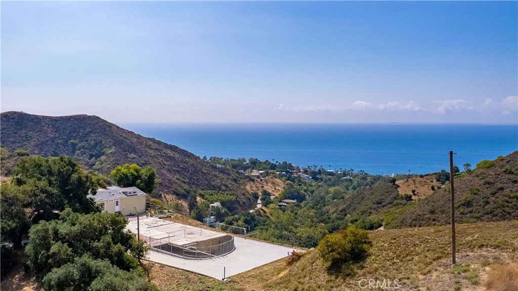 5767 Latigo Canyon Road Malibu, CA 90265 - Photo 7 of 54 Partial view of the ocean and canyons and the foundation and footings, and the house