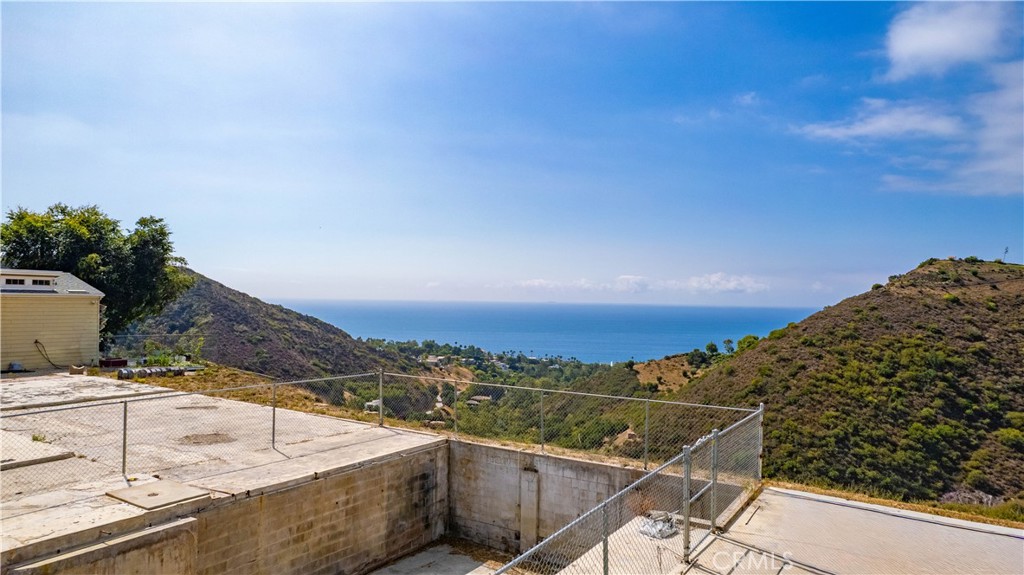 5767 Latigo Canyon Road Malibu, CA 90265 - Photo 9 of 54 Partial view of the ocean and canyons and the foundation and footings, and the house