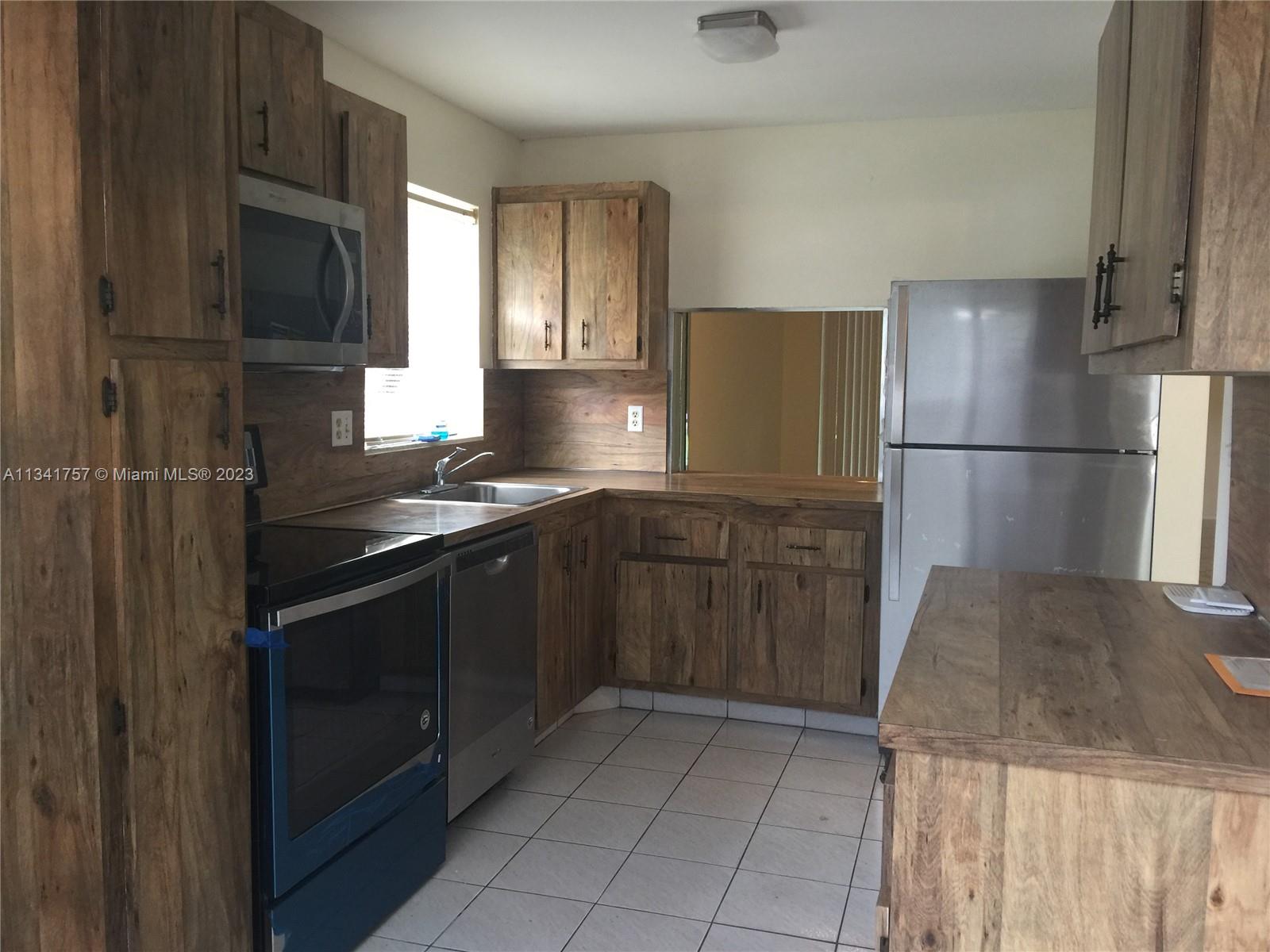8311 Sands Point Boulevard, Unit R101 Tamarac, FL 33321 - Photo 7 of 29 Gallery Image 7