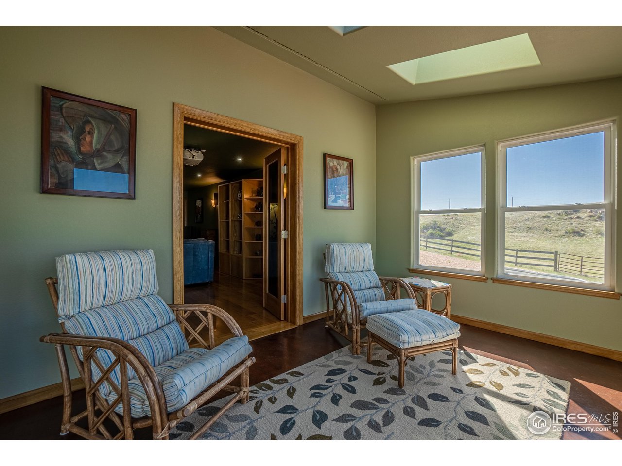 631 Linecamp Drive Livermore, CO 80536 - Photo 34 of 41 a living room with furniture and a window