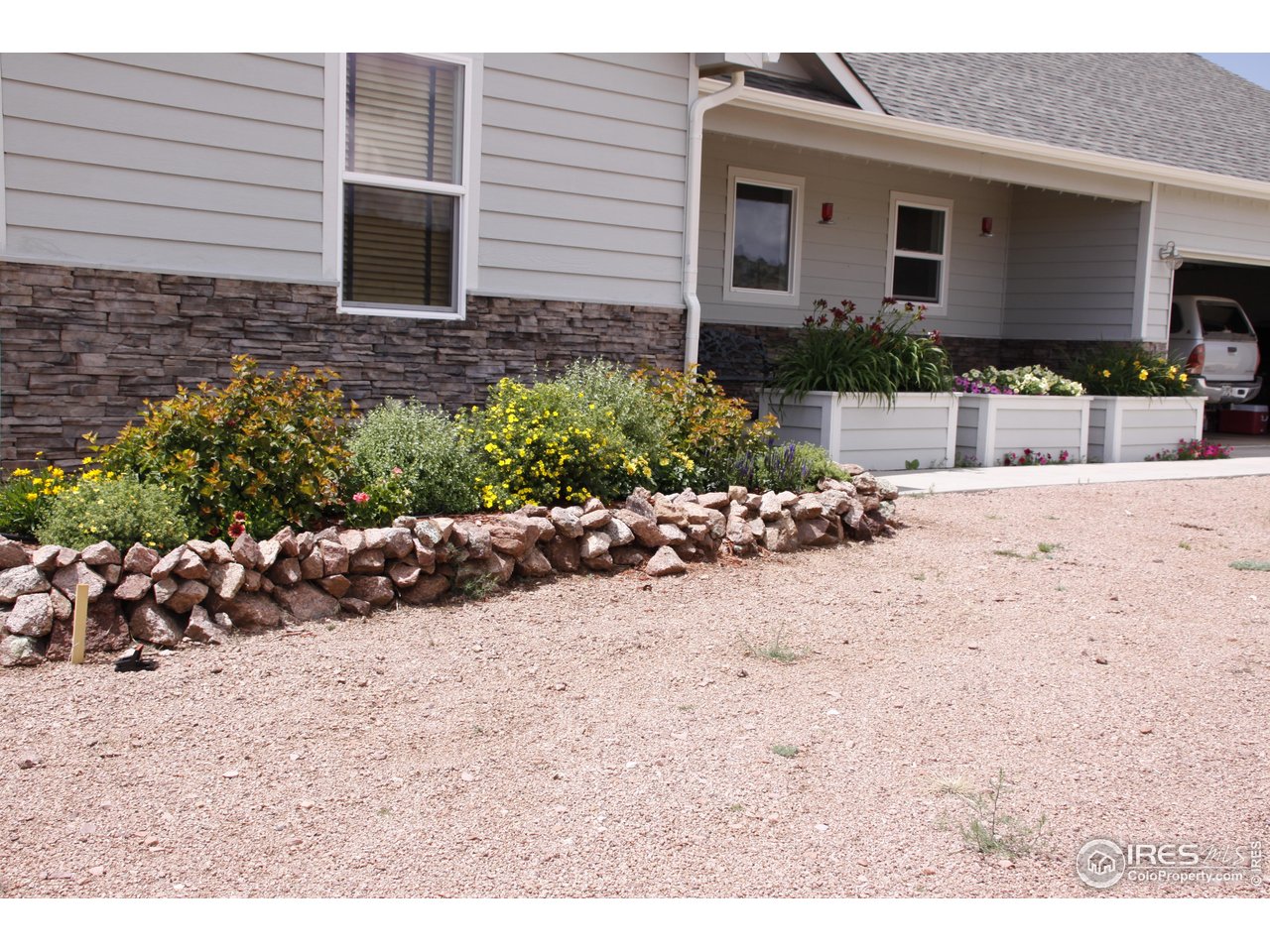 631 Linecamp Drive Livermore, CO 80536 - Photo 10 of 41 a view of a backyard of the house