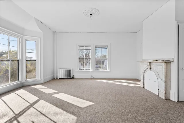 a view of a livingroom with a staircase