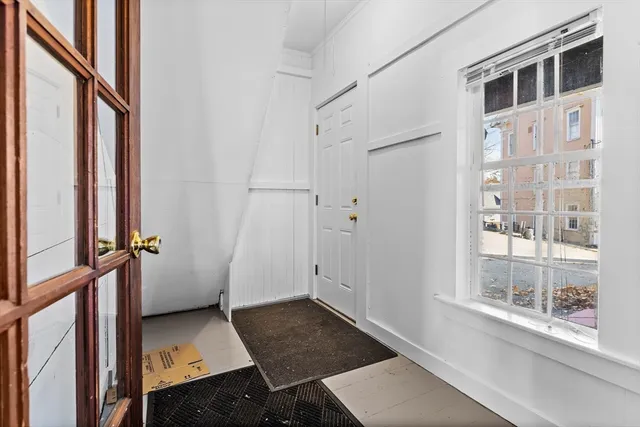 a view of an entryway with livingroom