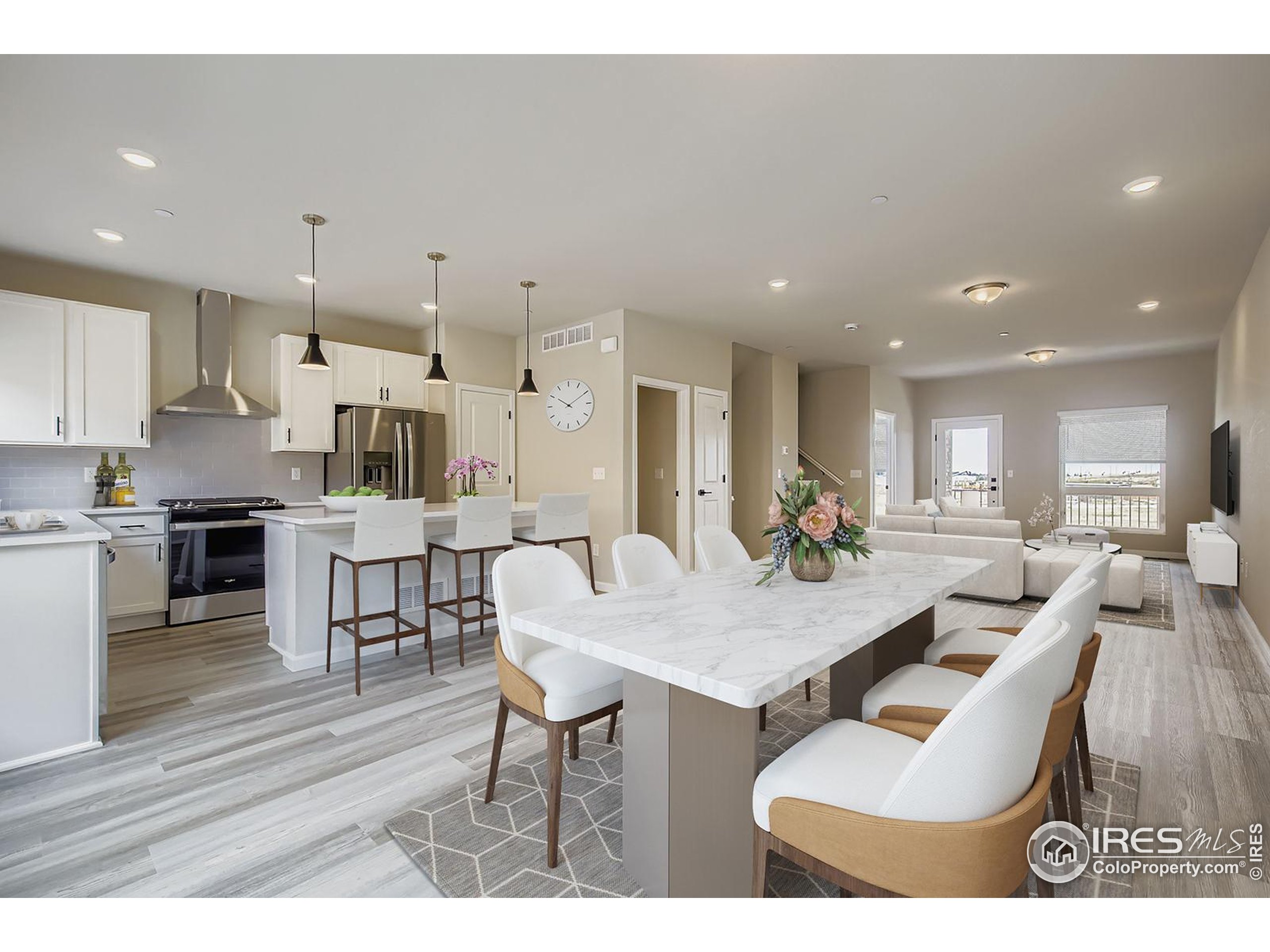 a view of kitchen with dining table and chairs