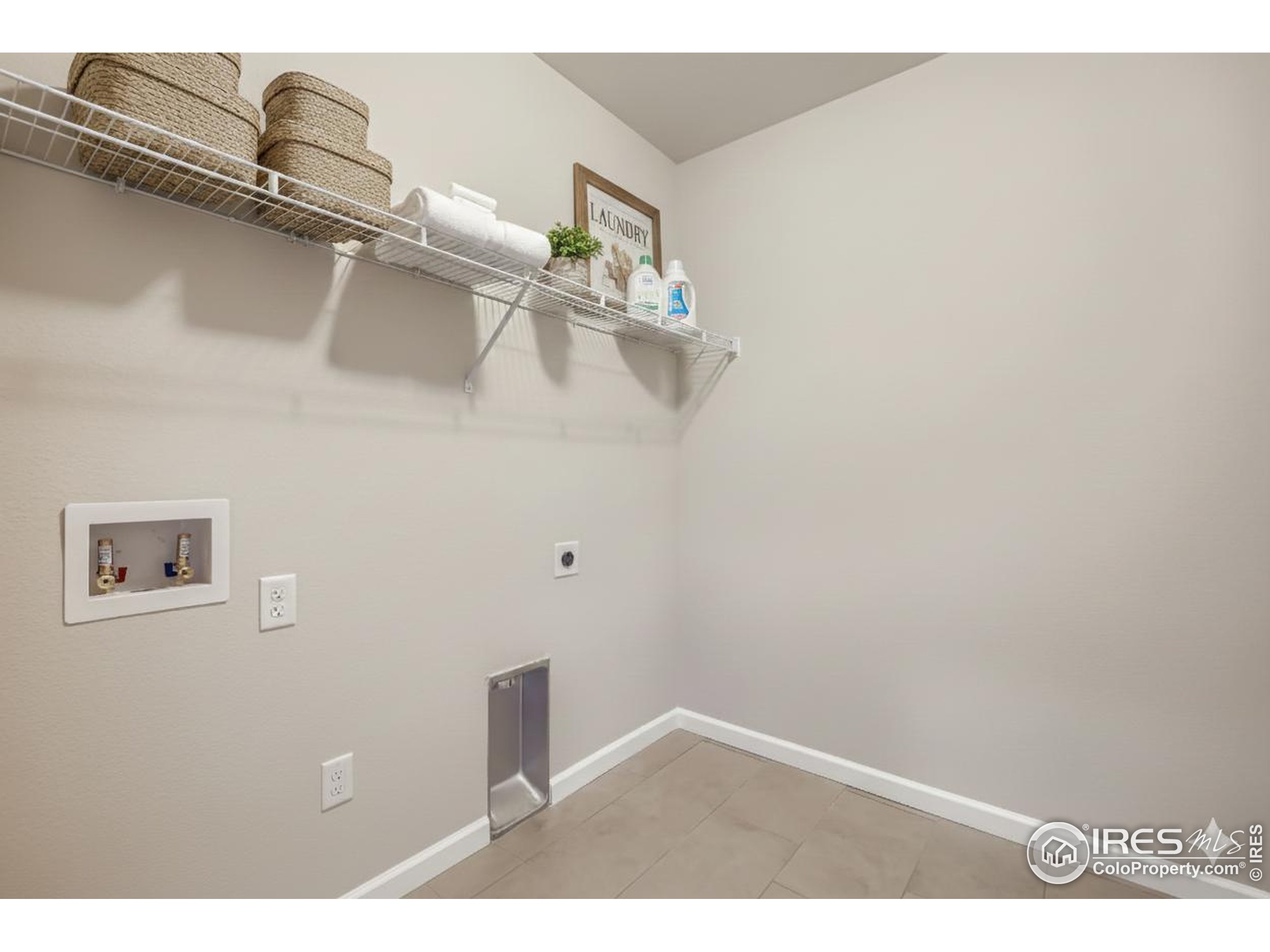 945 Abbott Lane, Unit 4 Fort Collins, CO 80524 - Photo 17 of 20 a view of a room with racks on the wall