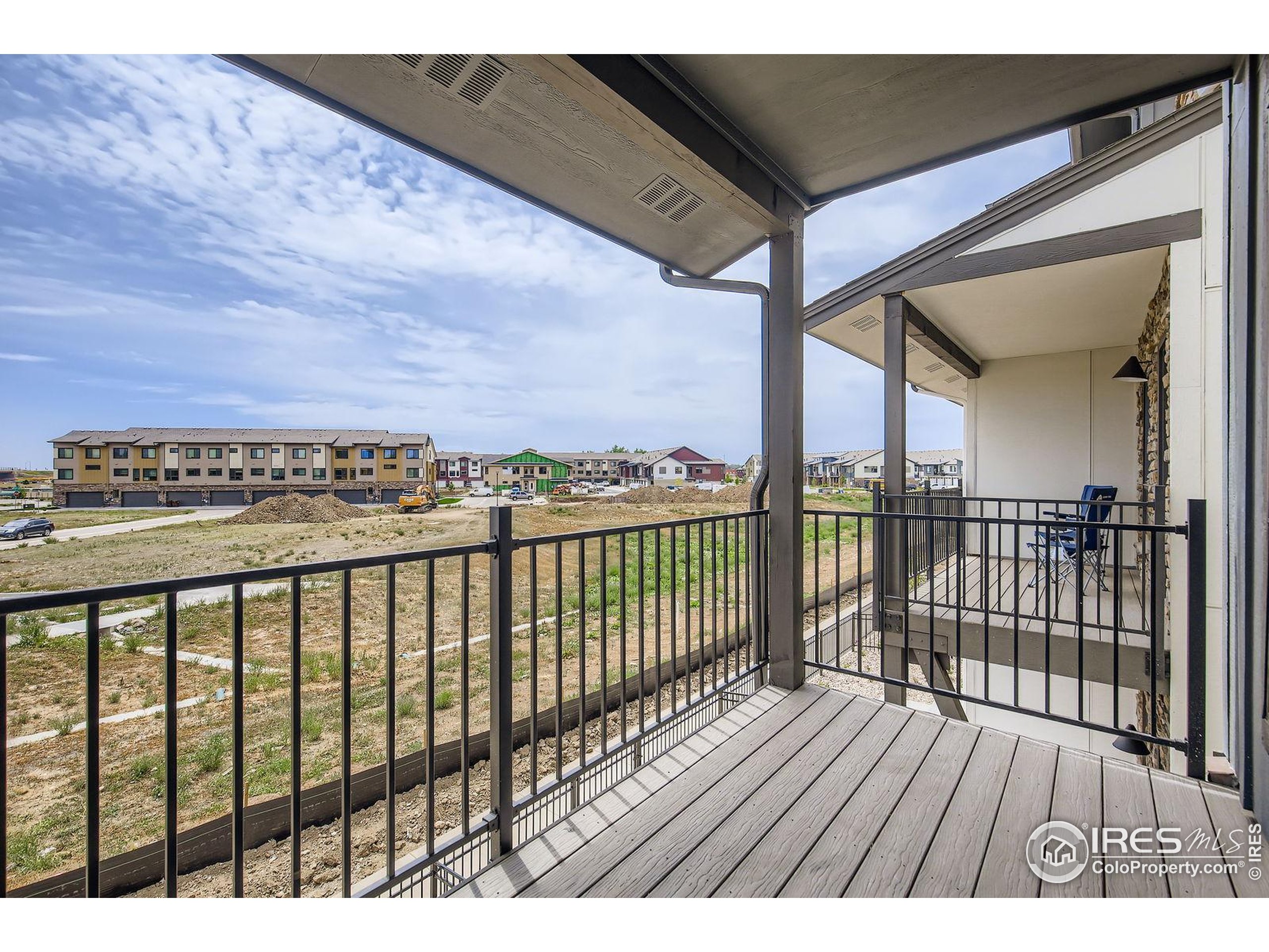 945 Abbott Lane, Unit 4 Fort Collins, CO 80524 - Photo 19 of 20 a view of city from a balcony