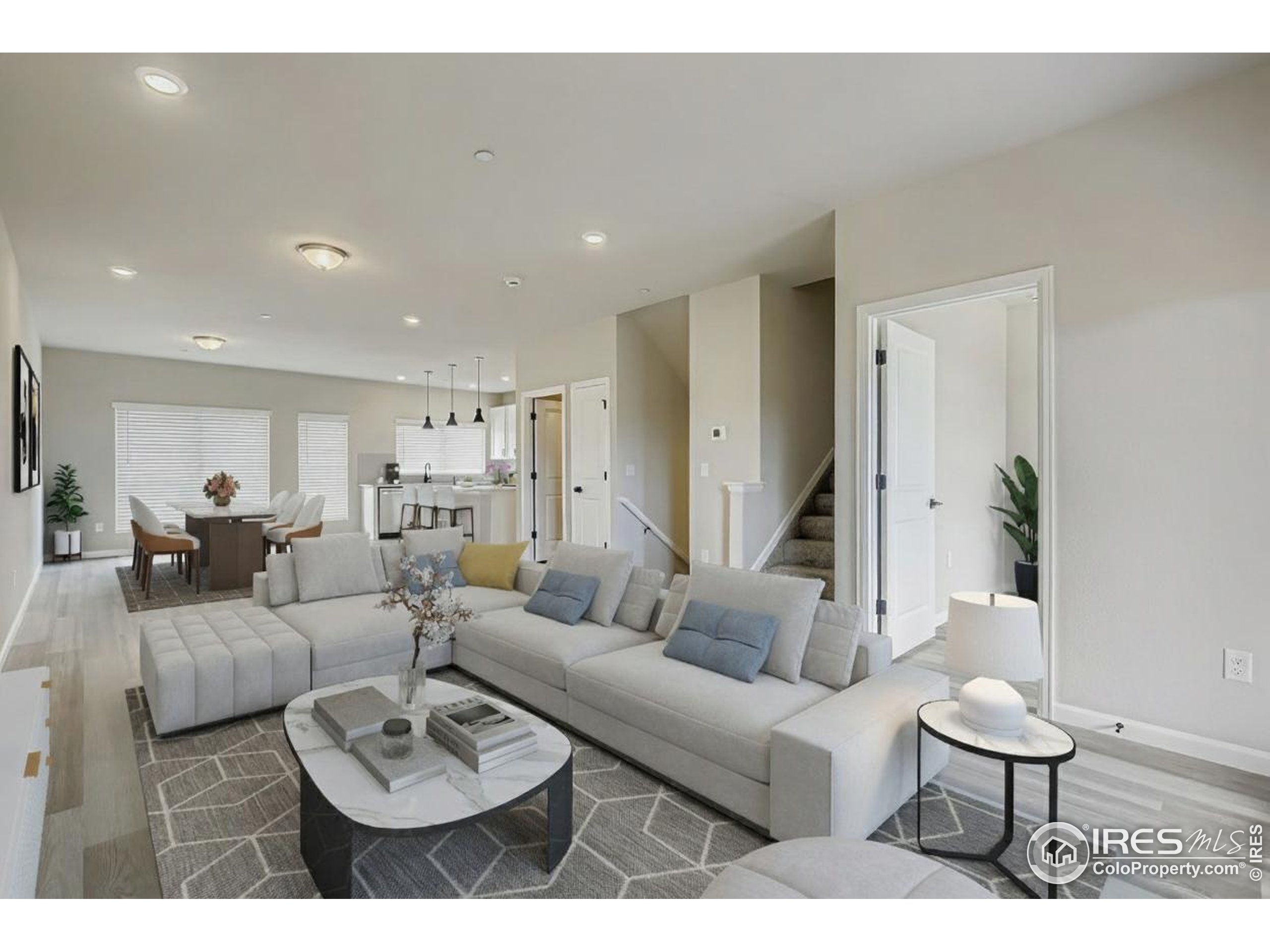 945 Abbott Lane, Unit 4 Fort Collins, CO 80524 - Photo 4 of 20 a living room with furniture and a table