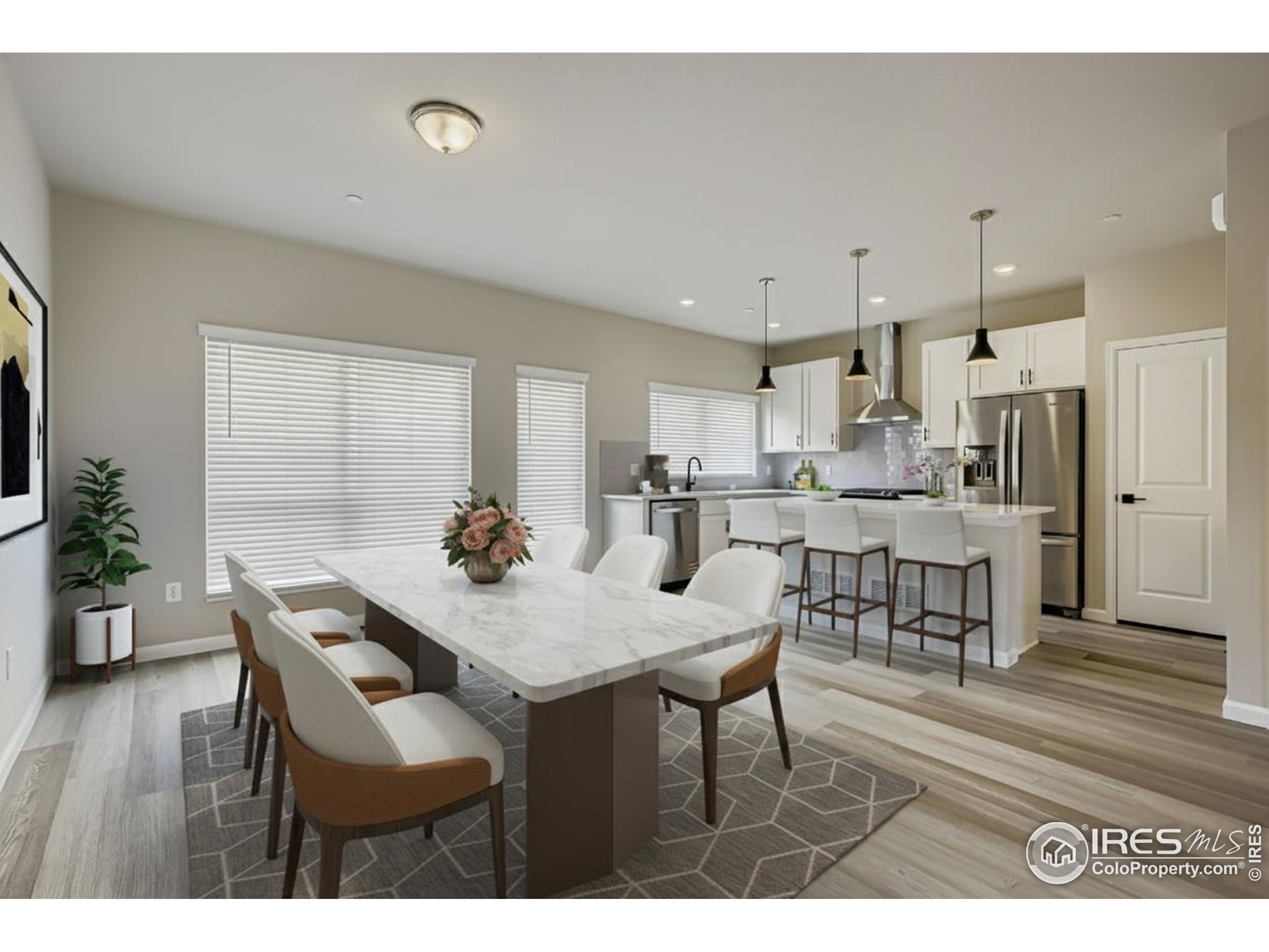 945 Abbott Lane, Unit 4 Fort Collins, CO 80524 - Photo 8 of 20 a view of a dining room with furniture and wooden floor