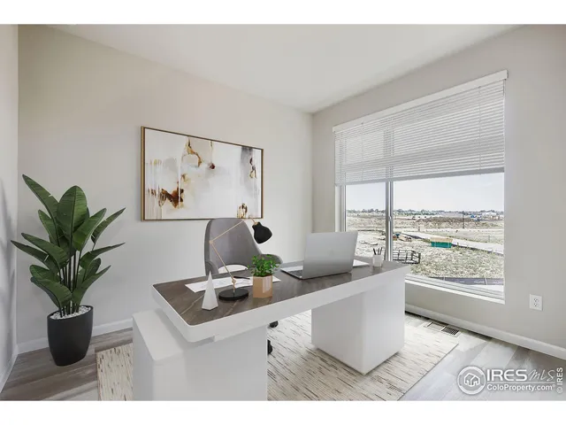 a living room with furniture and window