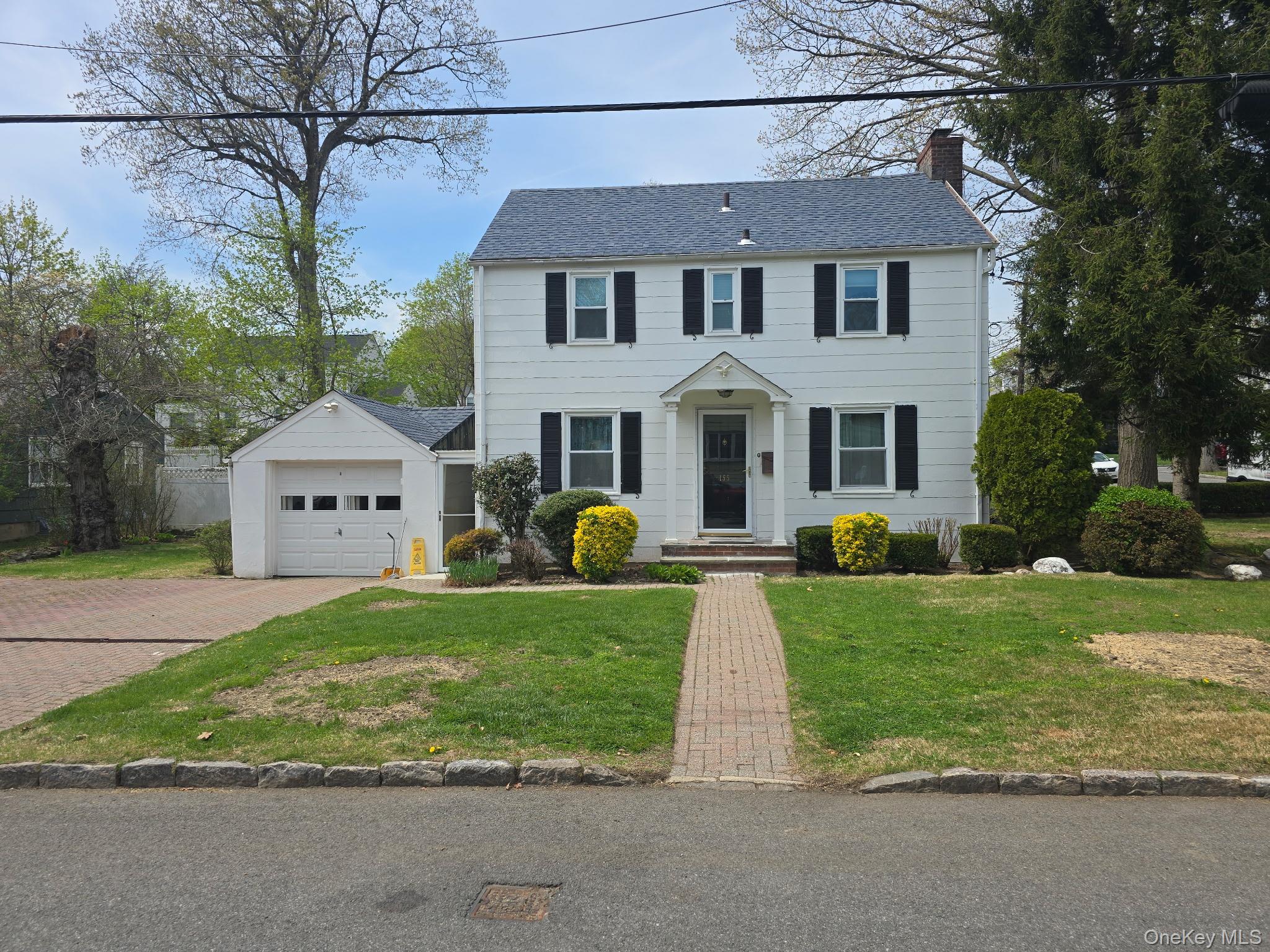 a view of house with garden
