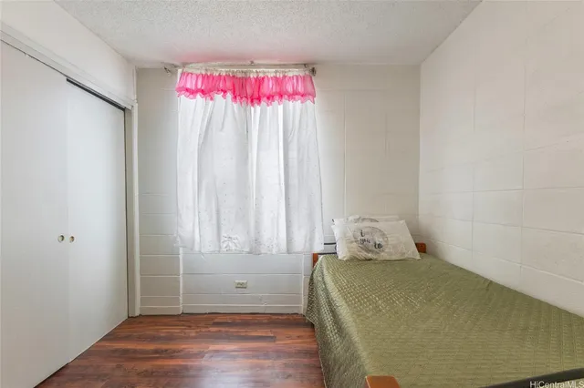 a room with a bed and a window