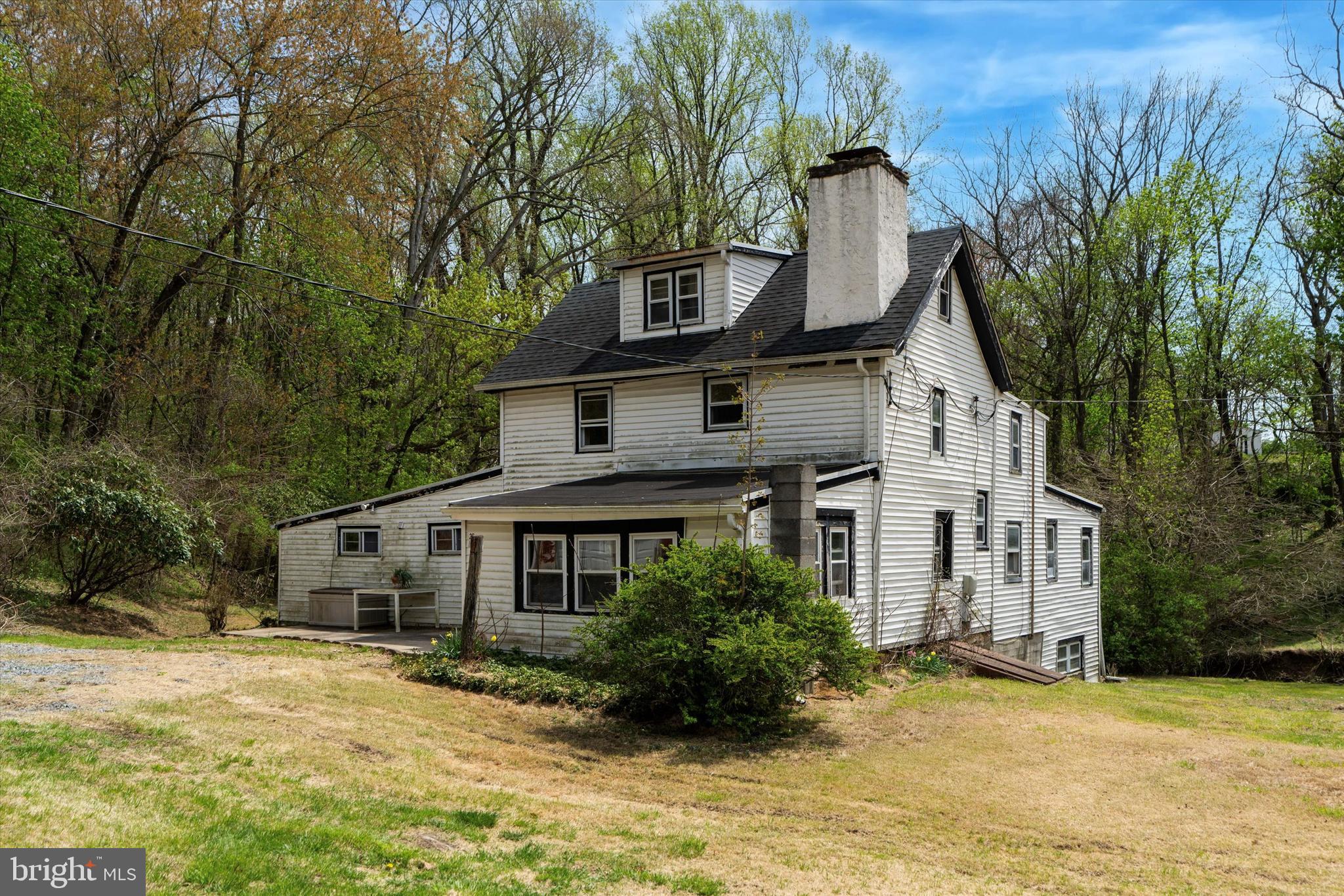 26 Rokeby Road Coatesville, PA 19320 - Photo 1 of 25 a front view of a house with a garden and tree