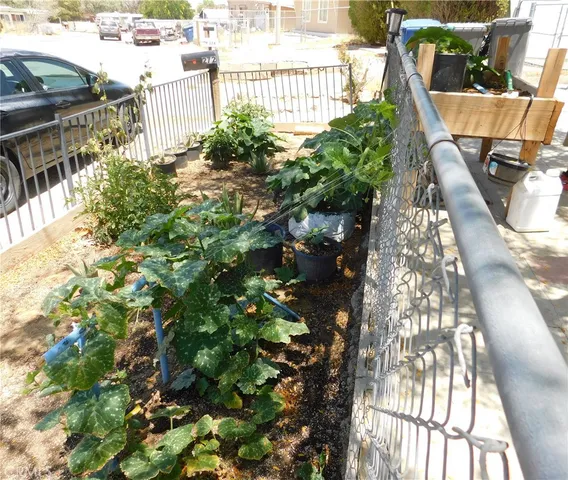 a view of balcony with wooden floor