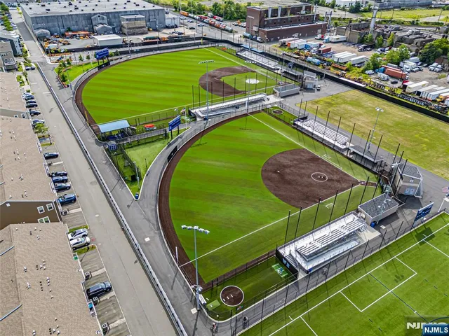 swimming pool view with a outdoor seating space