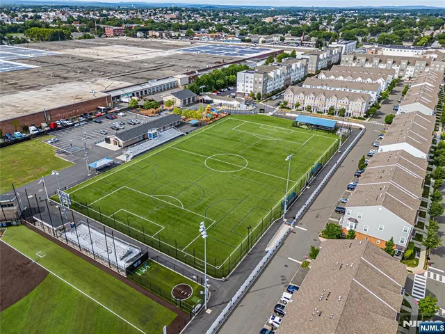 an aerial view of a tennis ground