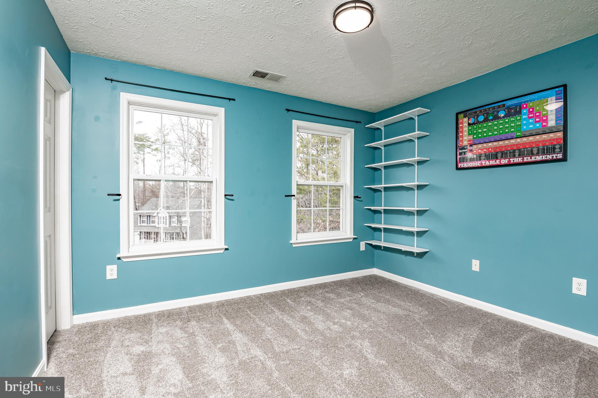 100 Surrey Drive Ruther Glen, VA 22546 - Photo 23 of 54 First Bedroom with Large Walk-in Closet!
