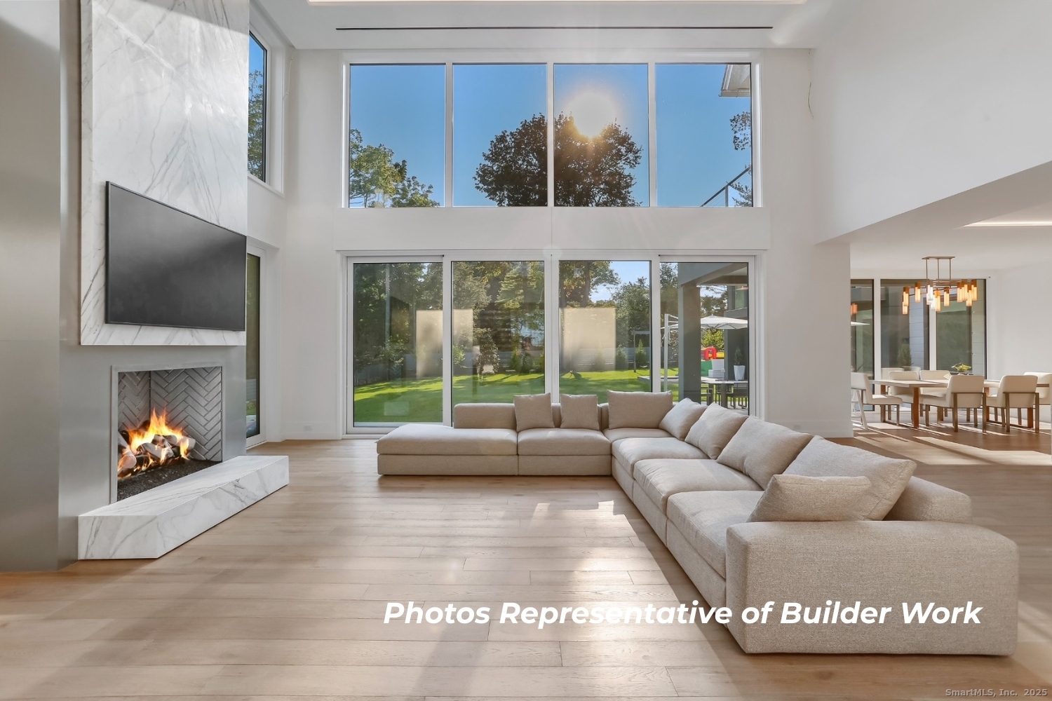 14 Burr School Road Westport, CT 06880 - Photo 12 of 16 a living room with furniture and a flat screen tv