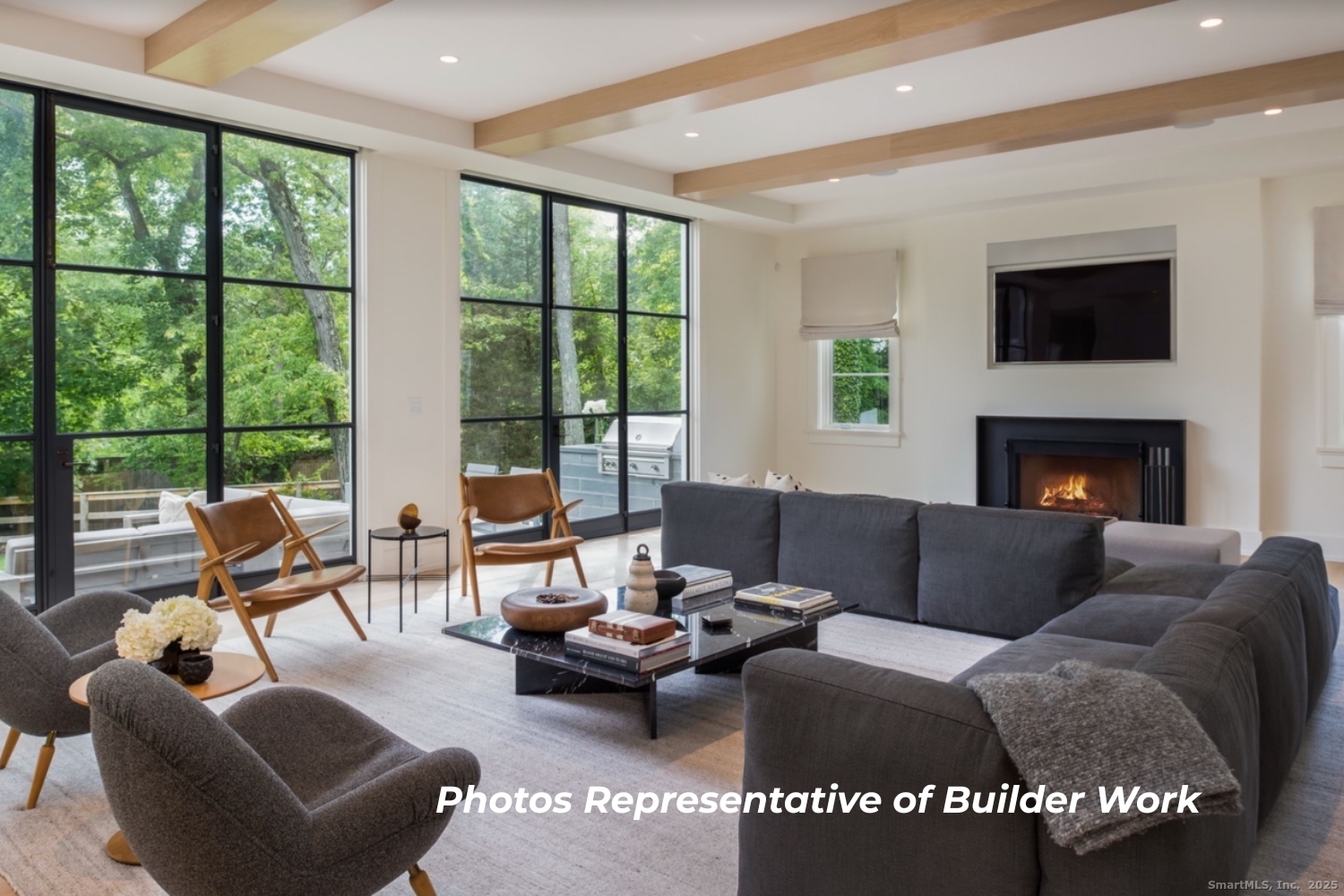14 Burr School Road Westport, CT 06880 - Photo 13 of 16 a living room with furniture and a fireplace