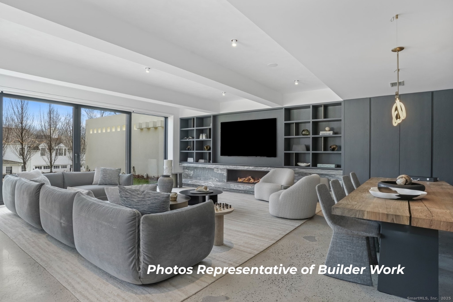 14 Burr School Road Westport, CT 06880 - Photo 15 of 16 a living room with furniture and a flat screen tv