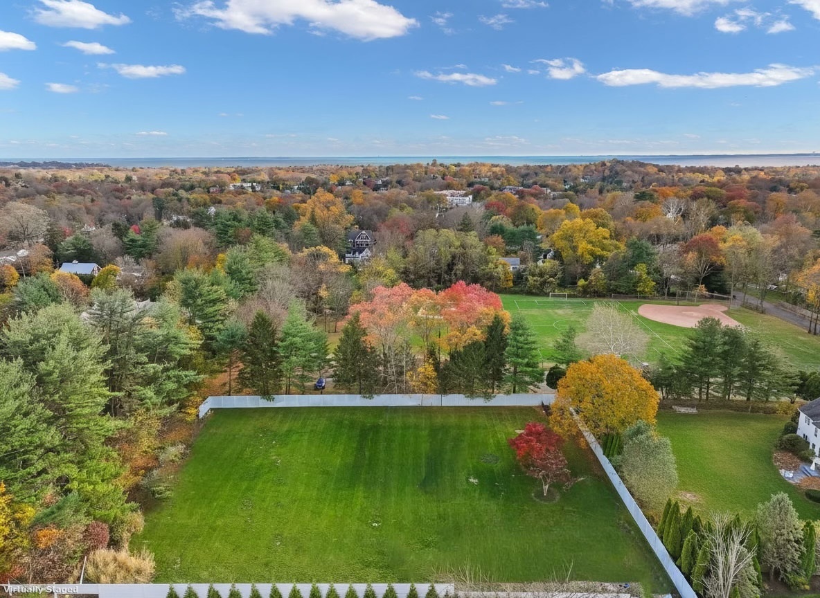 14 Burr School Road Westport, CT 06880 - Photo 6 of 16 a view of a lake with a city