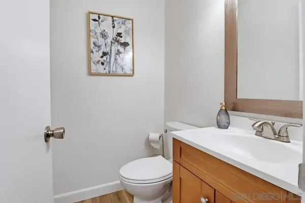 a bathroom with a toilet and a sink