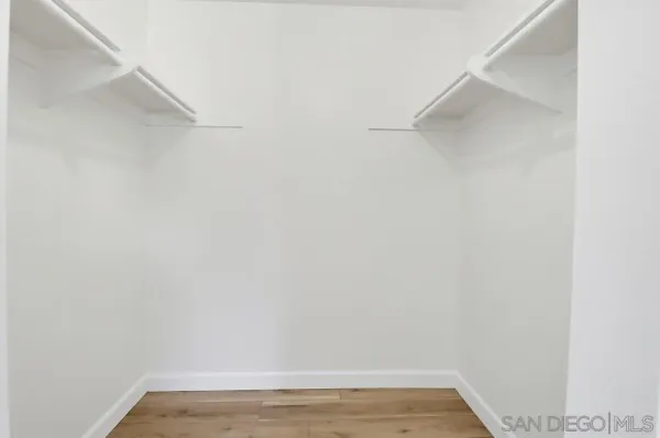 a view of small space with racks on the wall