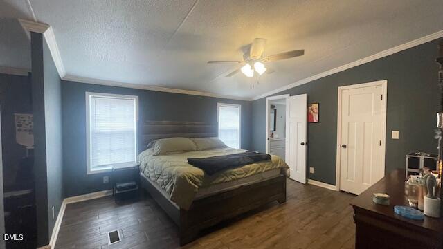 1959 Horseshoe Bend Road Erwin, NC 28339 - Photo 10 of 23 a spacious bedroom with a bed and a chandelier