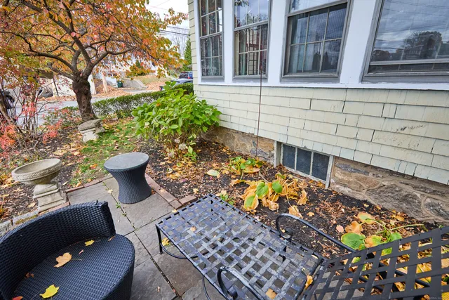 a view of a balcony with chairs