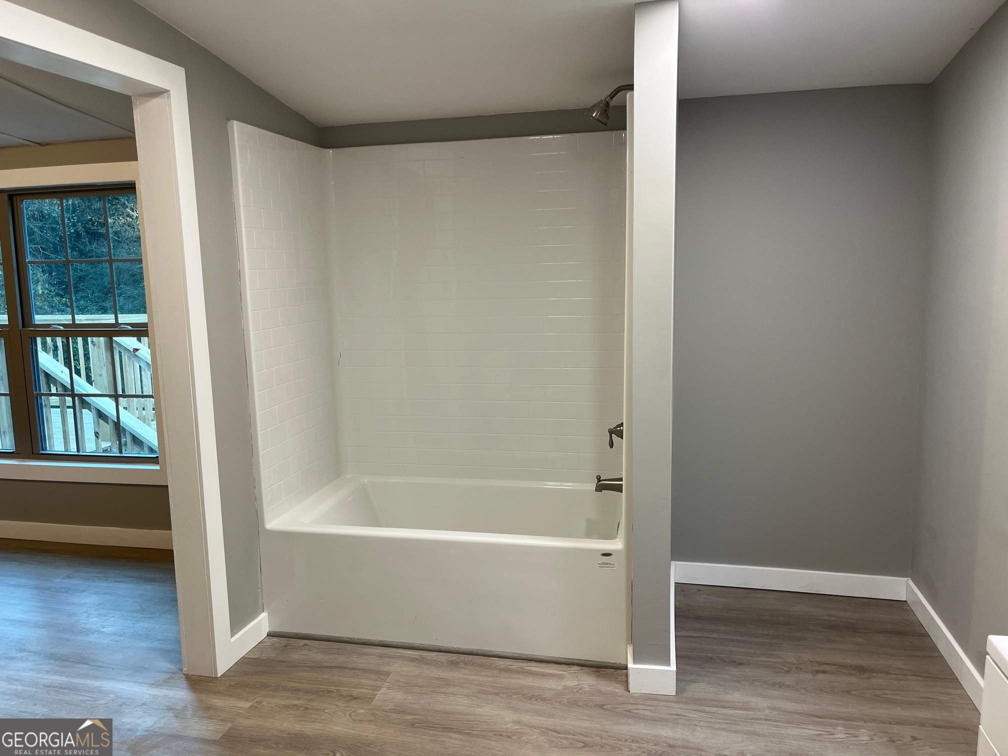 200 Cheatham Drive Athens, GA 30606 - Photo 11 of 36 a bathroom with a bathtub and a window