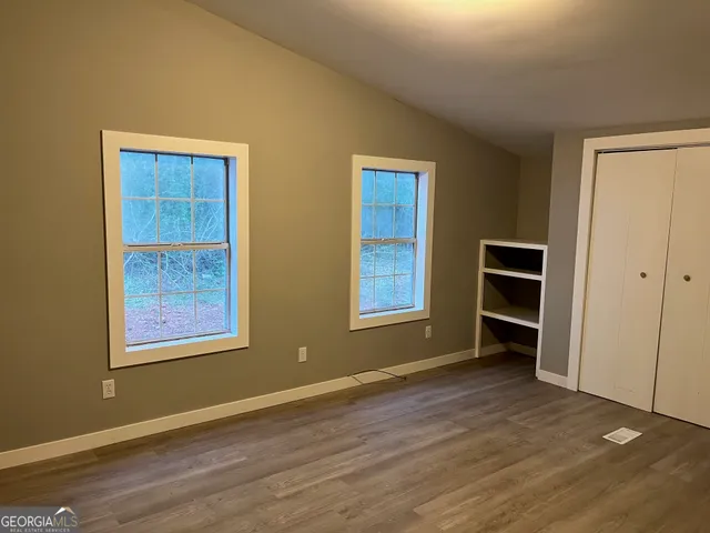 a view of a wooden fence