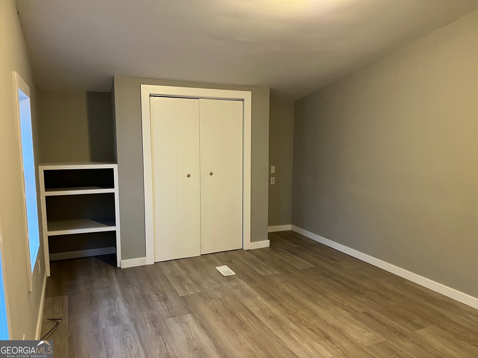 200 Cheatham Drive Athens, GA 30606 - Photo 23 of 36 a view of an empty room with closet and a window