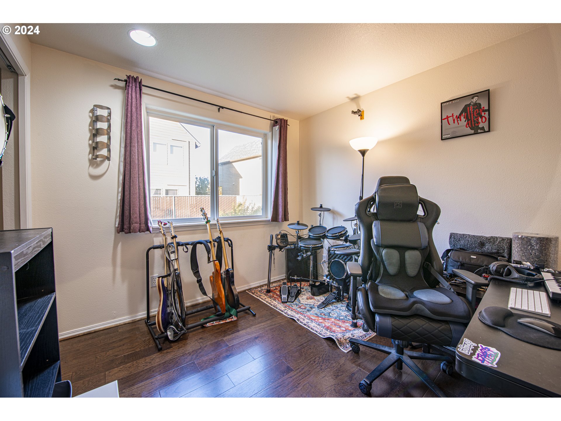 4128 Forsythia Street Springfield, OR 97478 - Photo 17 of 27 a view of a workspace with furniture and a window